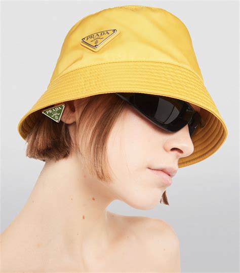 prada raffia visor|prada re nylon bucket hat.